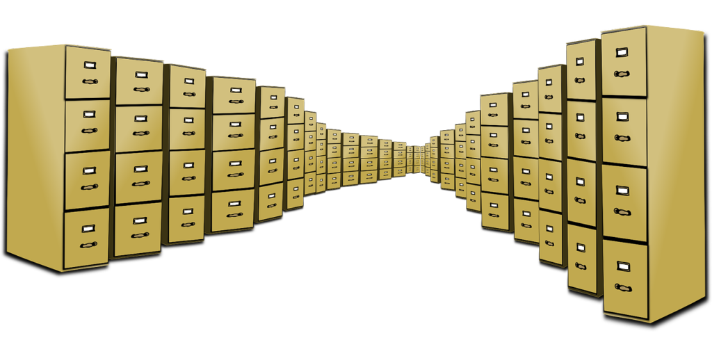 Ilustracja przedstawia rzędy szafek z dokumentami
